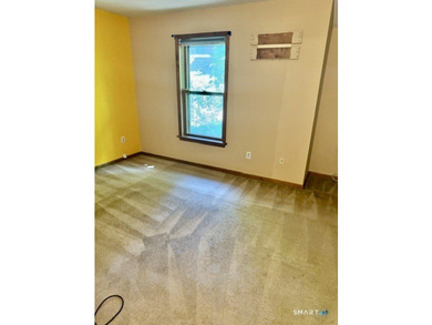 Well-maintained trilevel end-unit townhouse condominium in Fair - photo 3