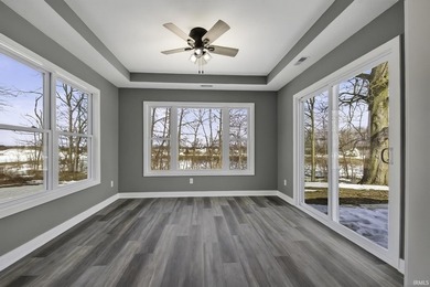 This new construction, ranch home, sits on a pond lot in the new - photo 13
