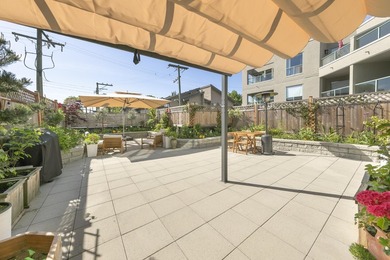 West-facing patio 'backyard' w/a condo price tag! This - photo 15