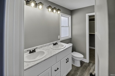 This new construction, ranch home, sits on a pond lot in the new - photo 16