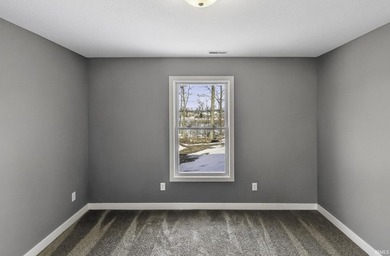 This new construction, ranch home, sits on a pond lot in the new - photo 19