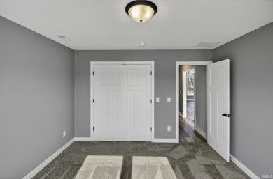 This new construction, ranch home, sits on a pond lot in the new - photo 20
