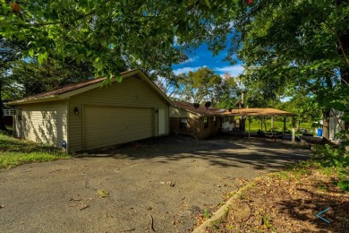 Introducing this charming 1,341 square-foot lakefront retreat on - photo 26