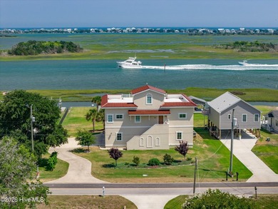 Enjoy a true waterfront boating lifestyle in this exceptional - photo 1