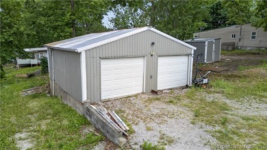 Charming 3-bedroom, 2-bath home located near the Lake of the - photo 3