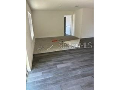 Short Sale. This single-story concrete block home offers a - photo 3