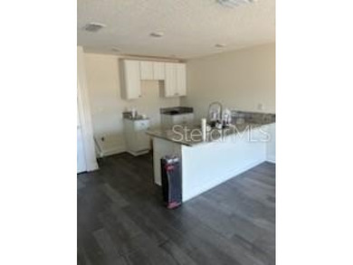 Short Sale. This single-story concrete block home offers a - photo 4