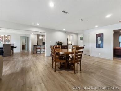 Turnkey luxury and breathtaking lakefront views await in this - photo 7