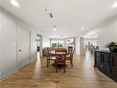Turnkey luxury and breathtaking lakefront views await in this - photo 8
