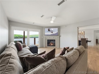 Turnkey luxury and breathtaking lakefront views await in this - photo 10