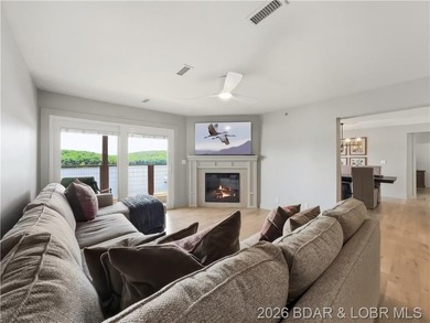 Turnkey luxury and breathtaking lakefront views await in this - photo 10