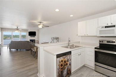Enjoy the Lake of the Ozarks lifestyle in this beautifully - photo 1