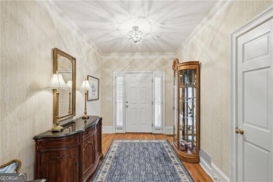 Well-designed and thoughtfully curated, this inviting condo just