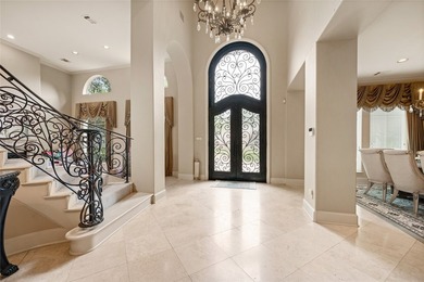 Welcome to this stunning Mediterranean-inspired residence in the - photo 2