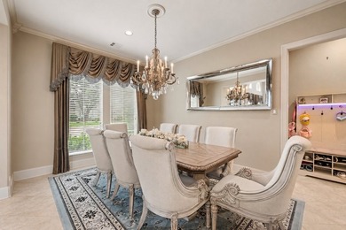 Welcome to this stunning Mediterranean-inspired residence in the - photo 6