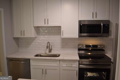 Gorgeous, professionally renovated Woodridge condo located in - photo 33
