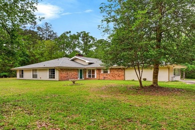 Tucked away on 10.08 beautiful acres, this 4 bedroom, 2 bath - photo 1