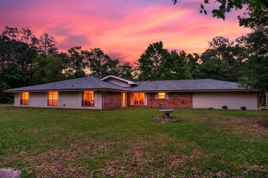 Tucked away on 10.08 beautiful acres, this 4 bedroom, 2 bath - photo 2