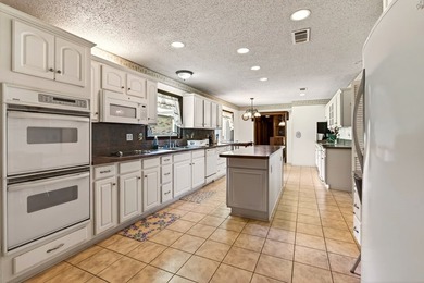 Tucked away on 10.08 beautiful acres, this 4 bedroom, 2 bath - photo 8