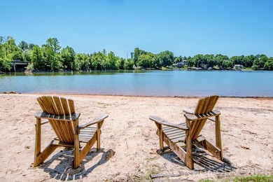 Lake access community featuring a boat ramp, boat dock, boat - photo 2