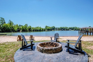 Lake access community featuring a boat ramp, boat dock, boat - photo 3