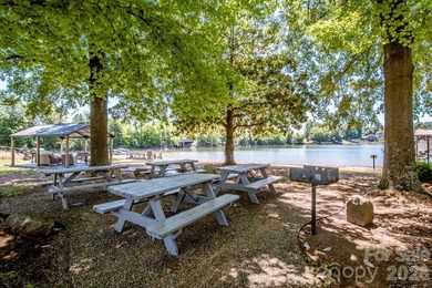 Lake access community featuring a boat ramp, boat dock, boat - photo 5
