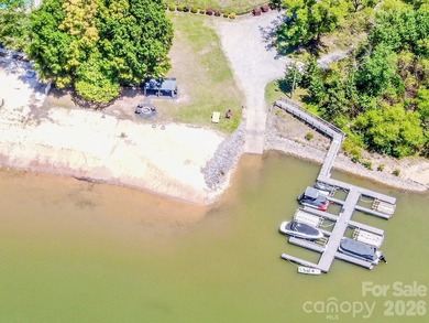 Lake access community featuring a boat ramp, boat dock, boat - photo 6