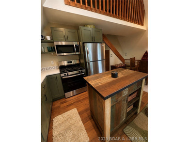 Welcome to 33725 Waterfront Drive in Stover, MO - a beautifully - photo 10