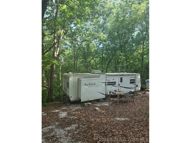 Tucked just off the pavement is this 5 acre parcel offering a - photo 2