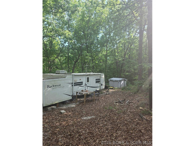 Tucked just off the pavement is this 5 acre parcel offering a - photo 3