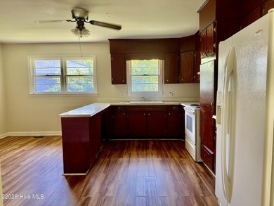 Well-priced brick home offers 3 bedrooms and a centrally located - photo 5