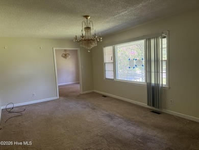 Well-priced brick home offers 3 bedrooms and a centrally located - photo 8