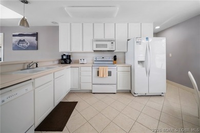 If you've been searching for a Lake Ozark condo with - photo 2
