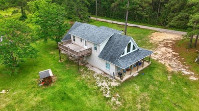 Welcome to peaceful country living! This two-story home sits on - photo 2