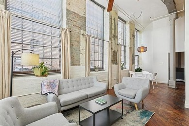 This rare, corner, ground-floor 2-bedroom, 2-bath unit in the