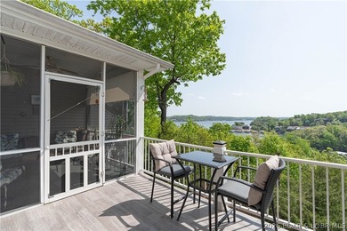 Walk-in, no steps, attached garage, lake views, and very low - photo 3