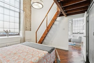 This rare, corner, ground-floor 2-bedroom, 2-bath unit in the