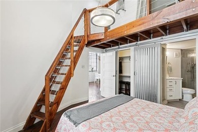 This rare, corner, ground-floor 2-bedroom, 2-bath unit in the