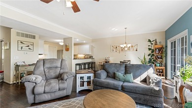 Walk-in, no steps, attached garage, lake views, and very low - photo 7