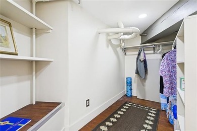 This rare, corner, ground-floor 2-bedroom, 2-bath unit in the