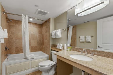 This turnkey-furnished two-bedroom, two-bath condo at 604 Sandy