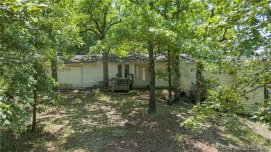 Fix-and-Flip Opportunity with Incredible Lakefront Views This - photo 1