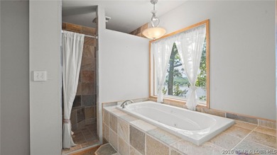 Investor Special with Lakefront & Development Potential! These - photo 3