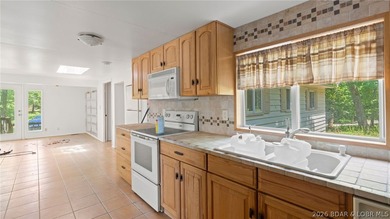 Investor Special with Lakefront & Development Potential! These - photo 8