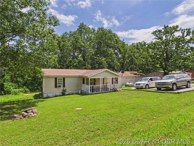 Looking for a property with potential? This 3-bedroom, 2-bath - photo 2