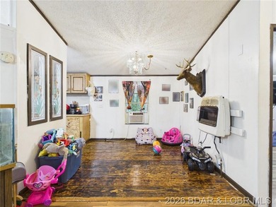 Looking for a property with potential? This 3-bedroom, 2-bath - photo 9