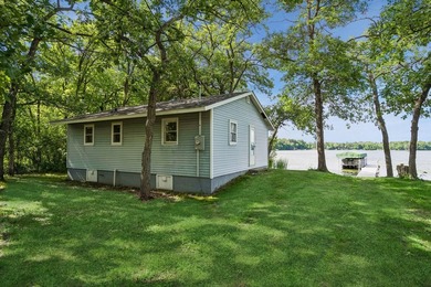 Discover a rare opportunity to own nearly an acre on Lake Julia - photo 11