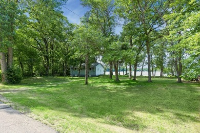 Discover a rare opportunity to own nearly an acre on Lake Julia - photo 12