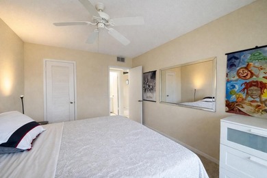 Immaculate 2-bedroom, 1.5-bath condo with a stunning lake view - photo 12