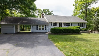 Lakefront living at its finest! This updated 4-bedroom, 3-bath - photo 3